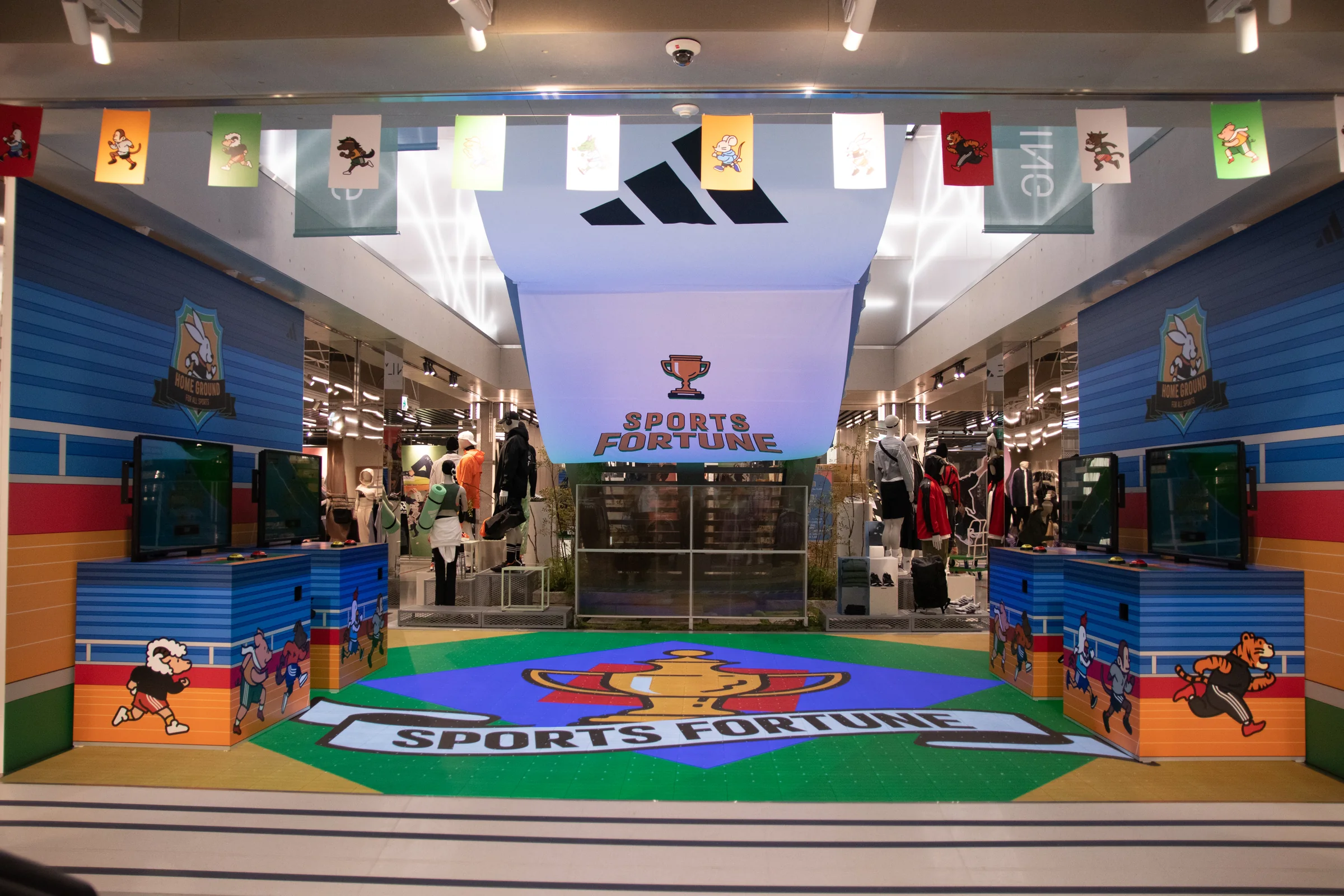The game zone with a SPORTS FORTUNE trophy scene on the LED floor