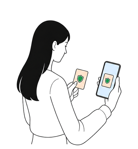 A participant holds a card in one hand and a phone showing the same card image in the other.