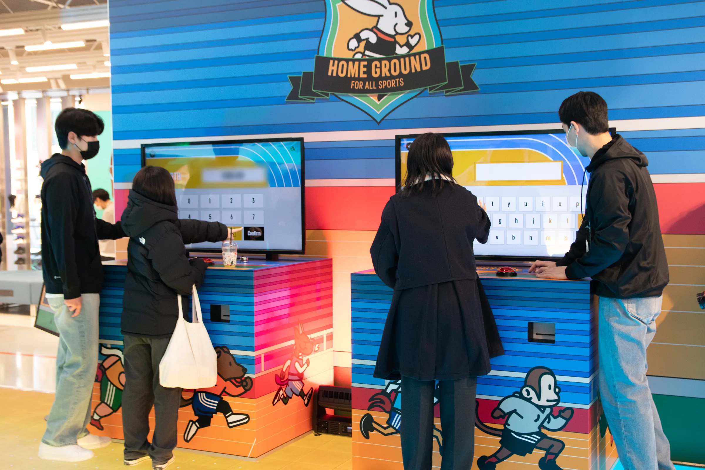 Participants entering their information at two machines