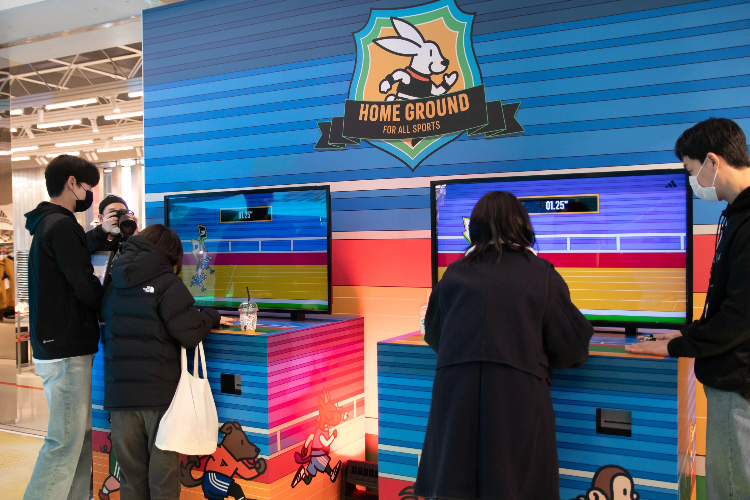 Participants racing side by side on two machines