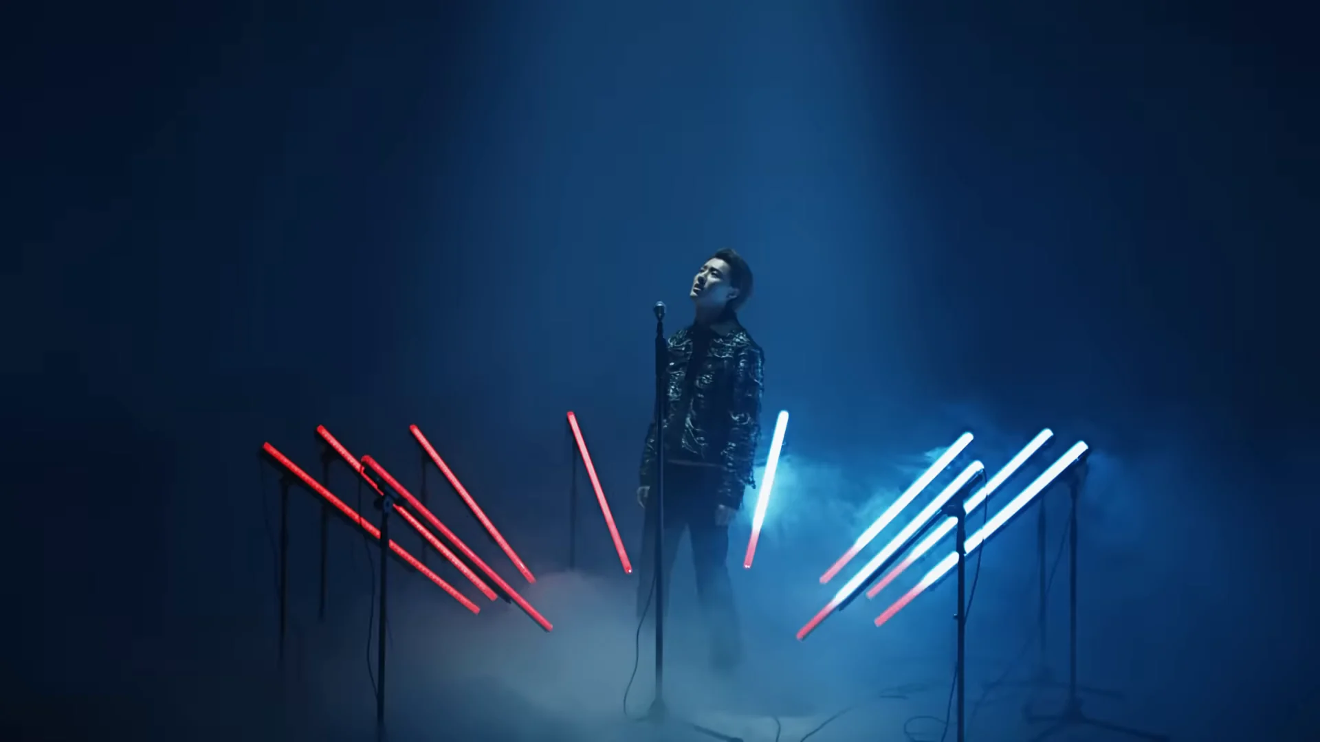 Red and white bars glow together above blue haze