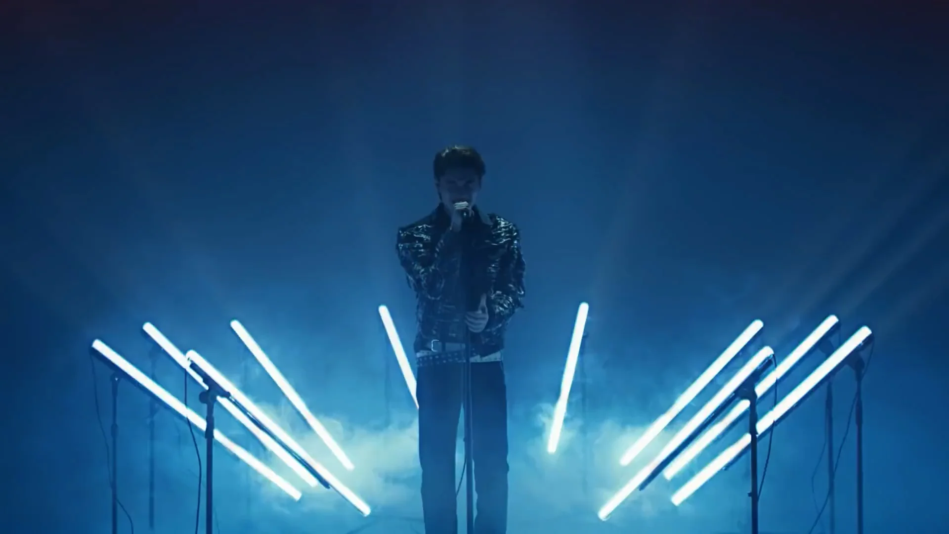 White and blue light bars illuminate together in blue haze